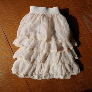 Tan Ruffled Skirt with lace.